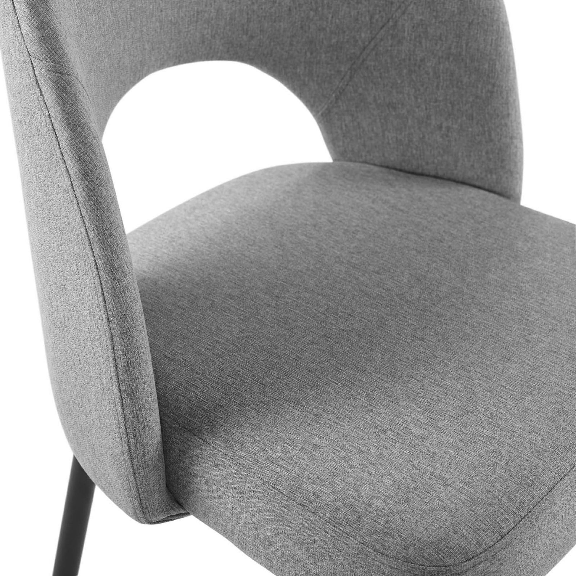 Grey fabric upholstered chair with rounded backrest cutout, cushioned seat, and slim black metal legs.