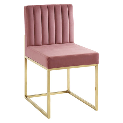 Dusty rose velvet dining chair with vertical channel back and gold metal frame.