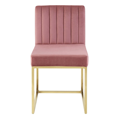 Dusty rose velvet dining chair with a tall channel-tufted back and a gold metal sled-base frame.