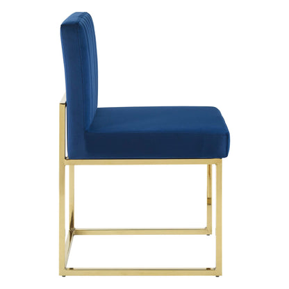 Navy blue performance velvet dining chair with a tall, channel-tufted back on a gold-tone metal sled-base frame.