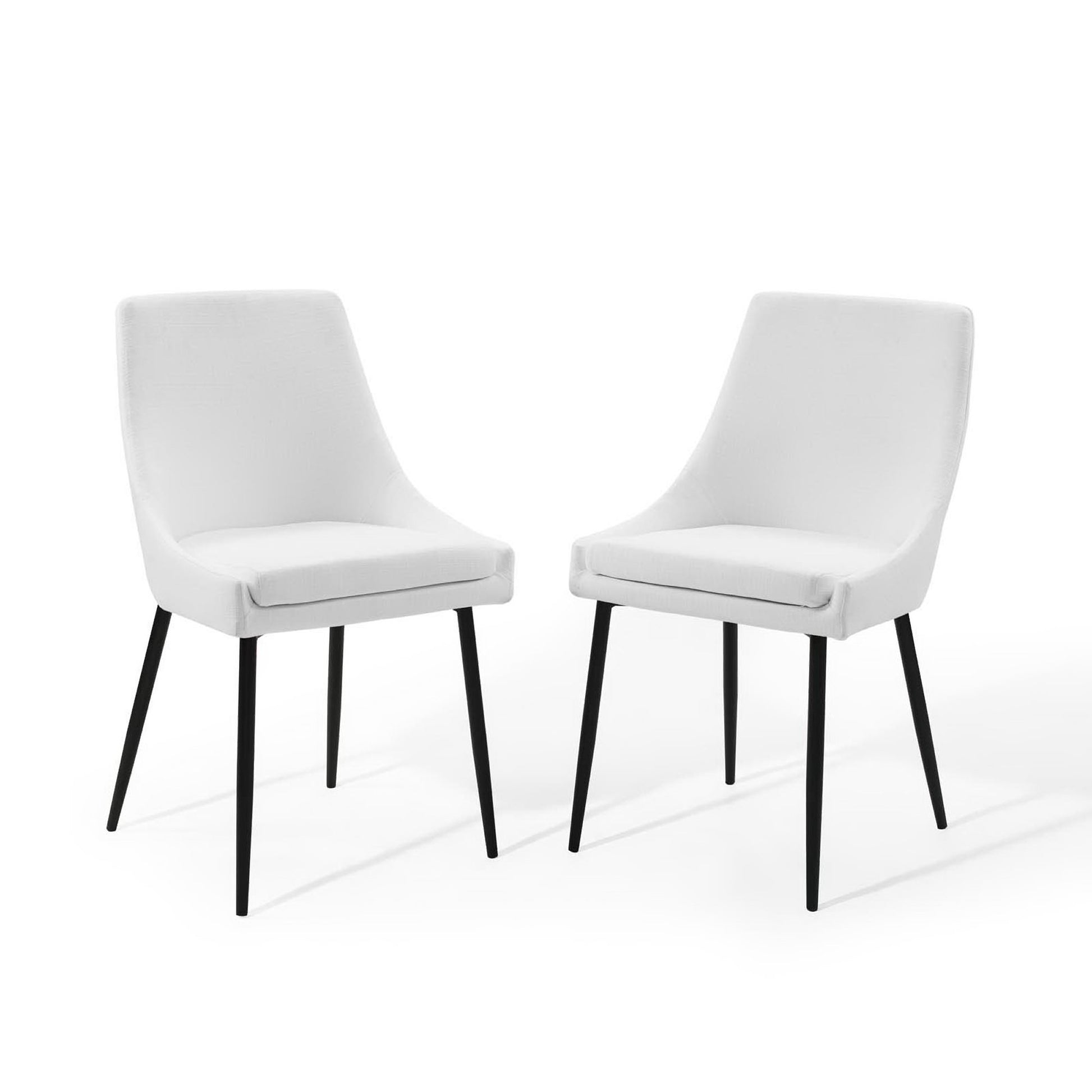 Set of 2 white upholstered dining chairs with curved backs and black tapered legs in a mid-century modern style.