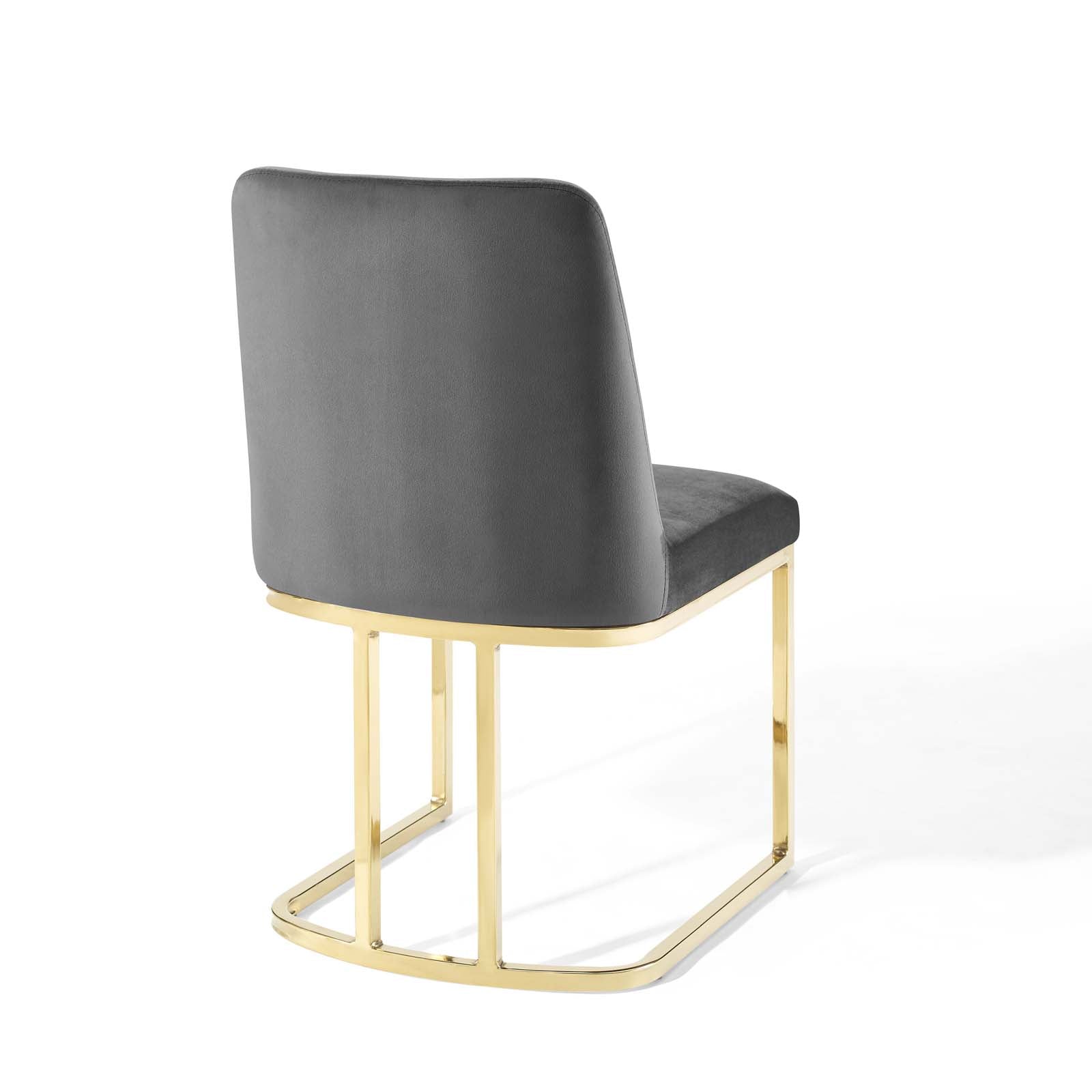 Gold-tone metal sled-base dining side chair with padded gray velvet upholstery, square back, modern minimalist design.