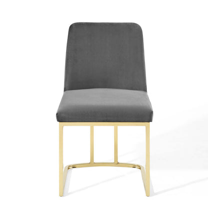 Gold metal-framed dining chair with charcoal gray velvet upholstered seat and back, modern minimalist style.