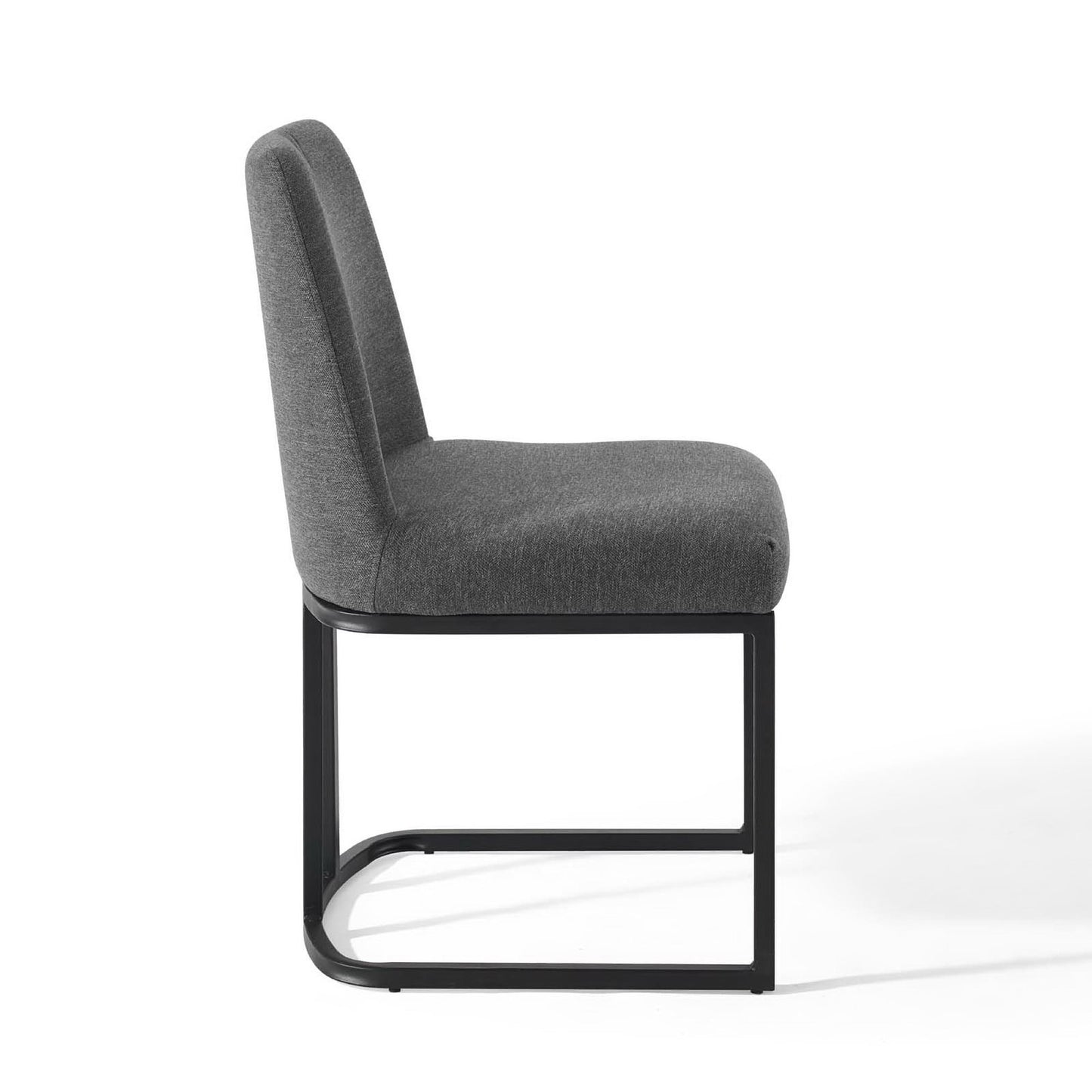 Grey fabric dining side chair with padded back and seat, black sled-base metal frame, modern minimalist design.