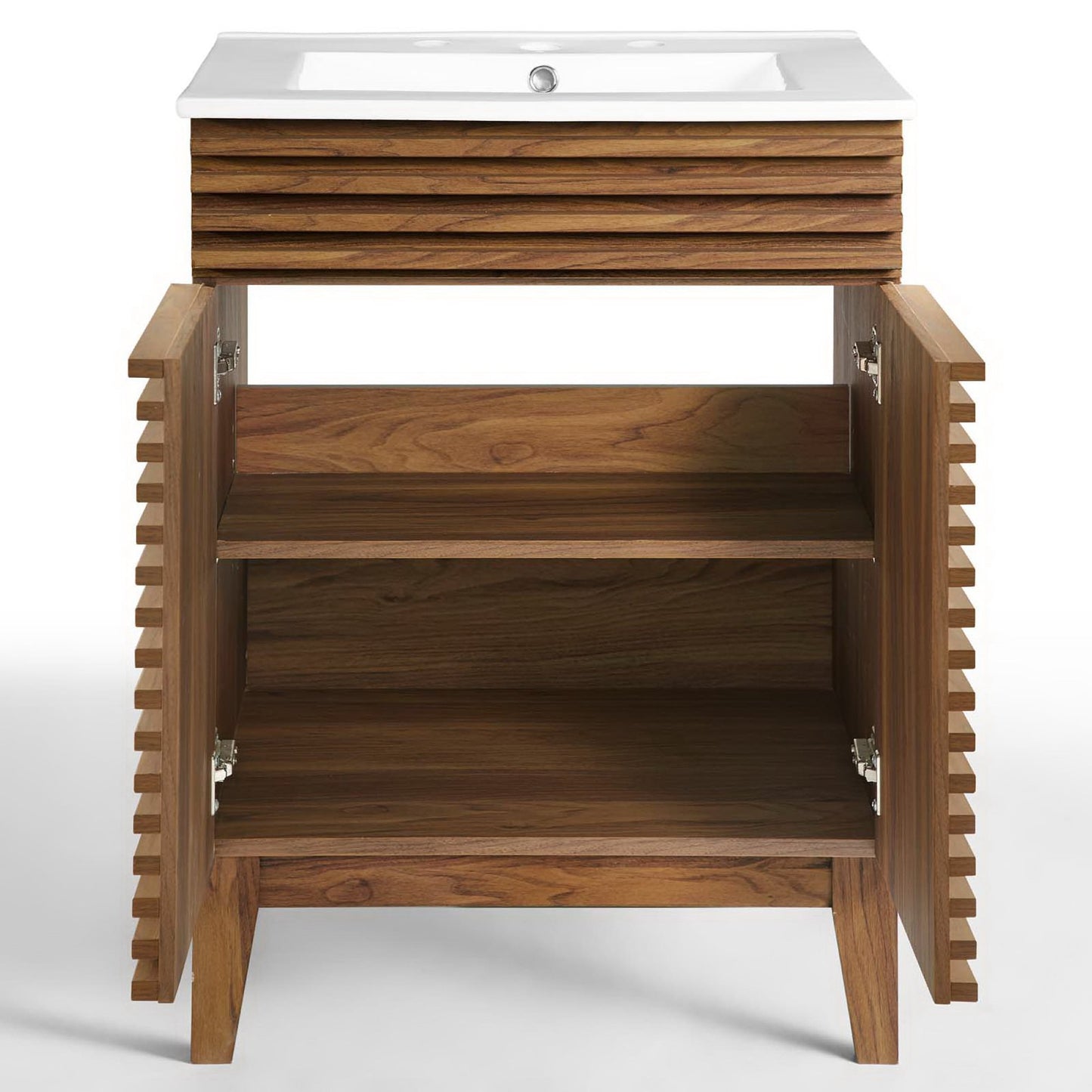 White bathroom vanity with white ceramic sink; louvered doors open to reveal two interior shelves.