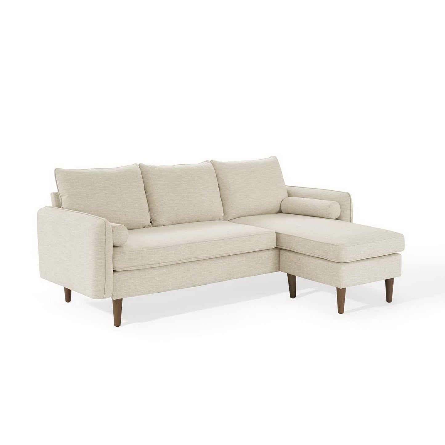 Beige fabric L-shaped sectional sofa with a chaise, three back cushions, and tapered wooden legs.