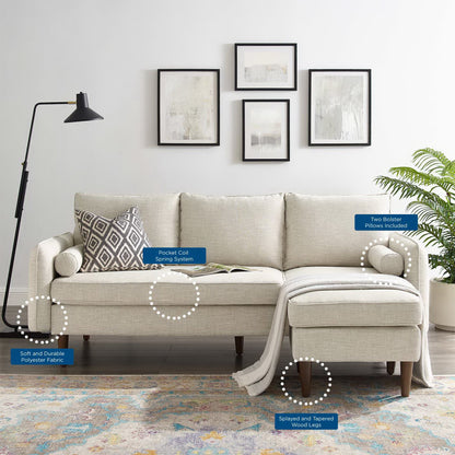 Brown L-shaped sectional with chaise, cream cushions, geometric pillow, black floor lamp, wall art, and colorful rug.