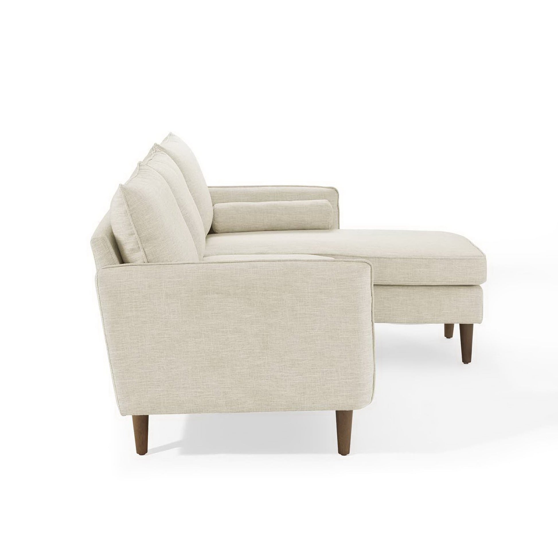 Beige fabric sectional sofa with chaise and tapered wooden legs.