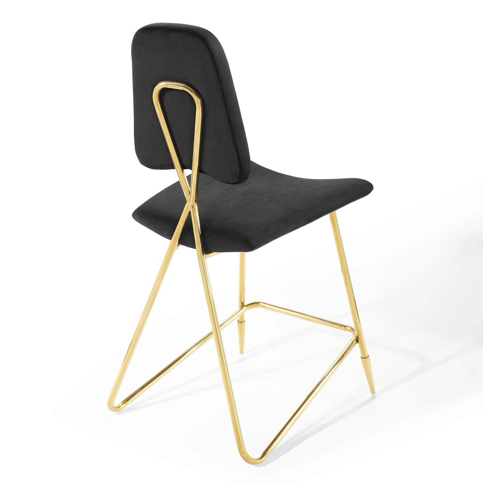 Black upholstered counter stool with gold metal sled base and curved backrest.