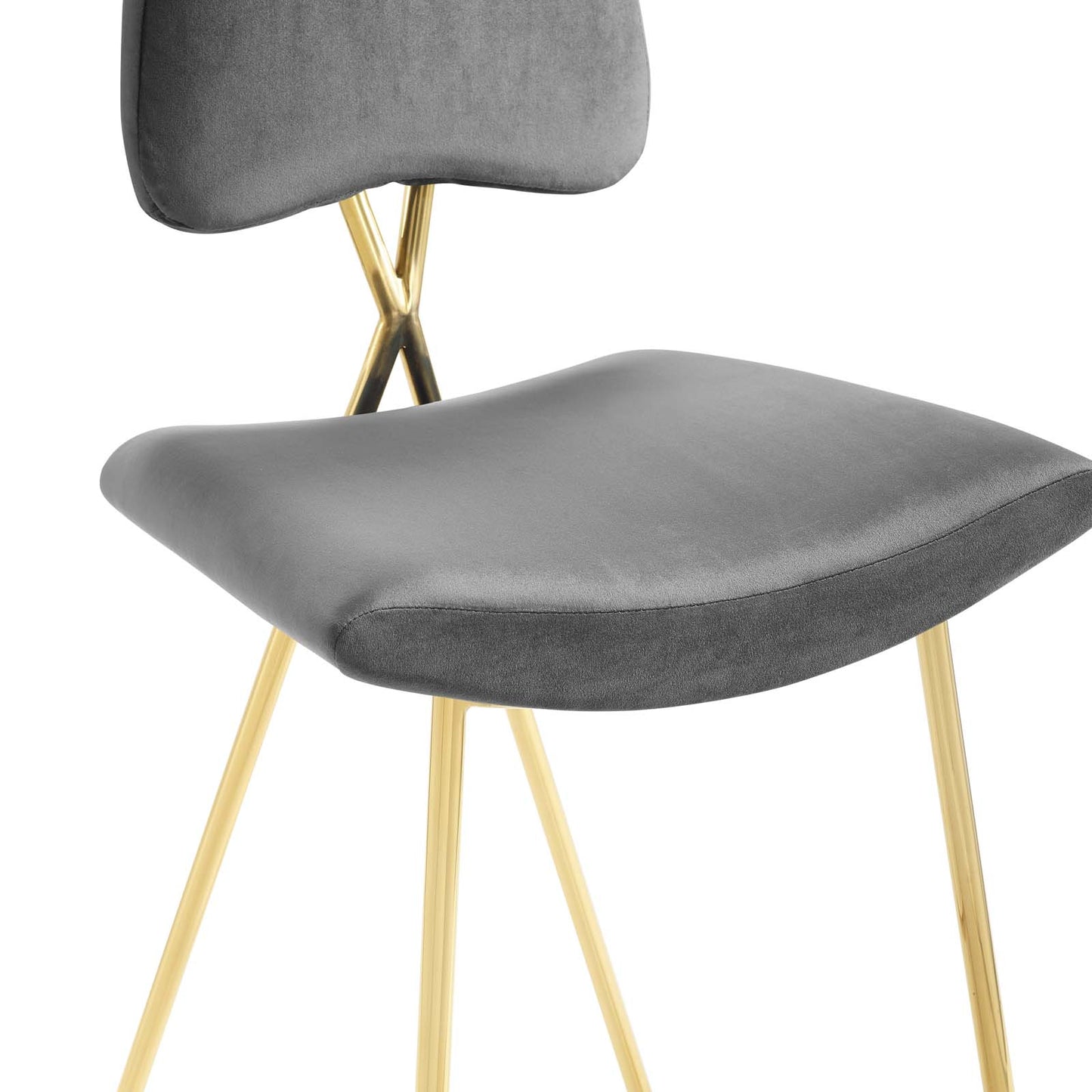 Grey velvet upholstered counter stool with curved seat and gold metal legs.