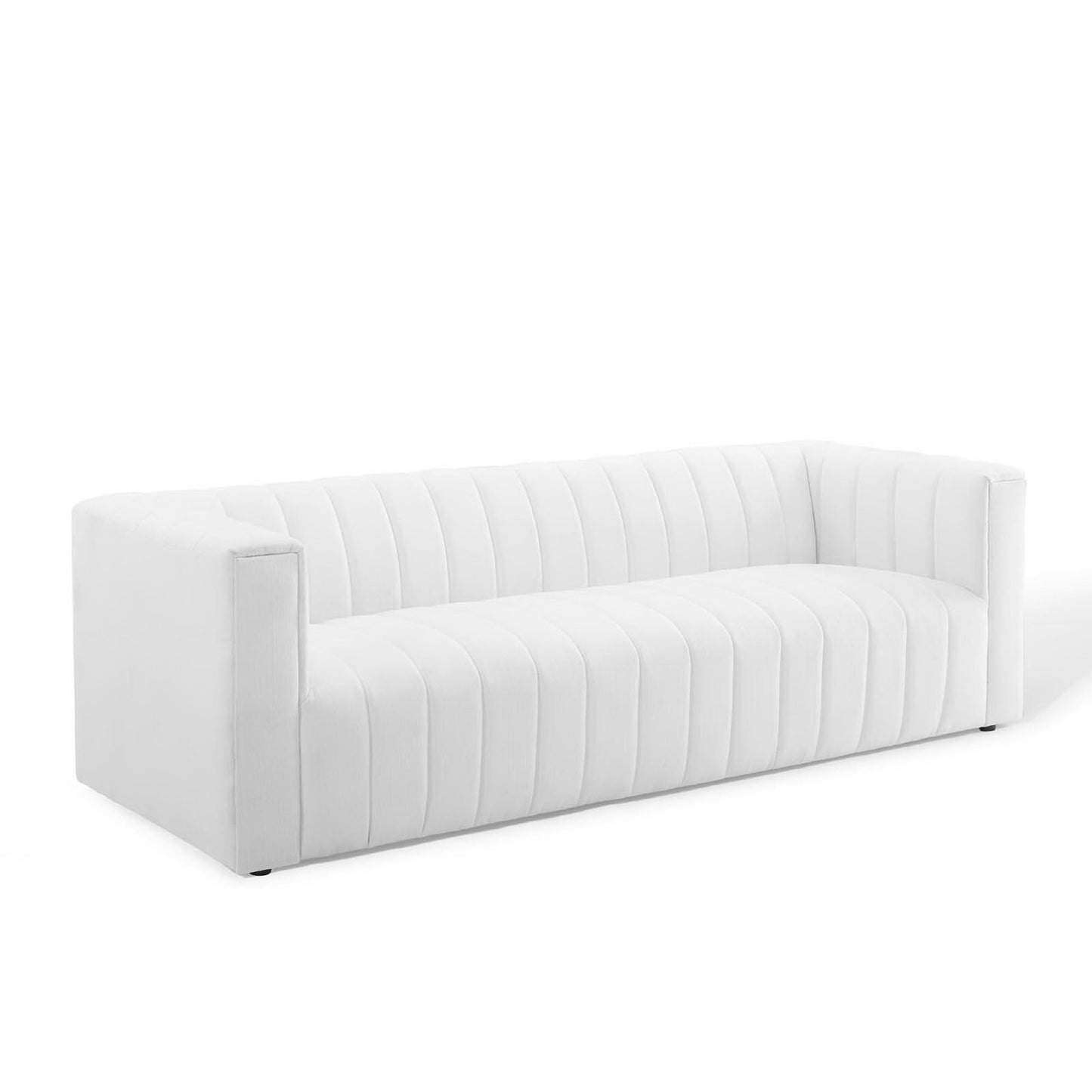 White modern sofa with vertical channel tufting, boxy arms and fabric upholstery.