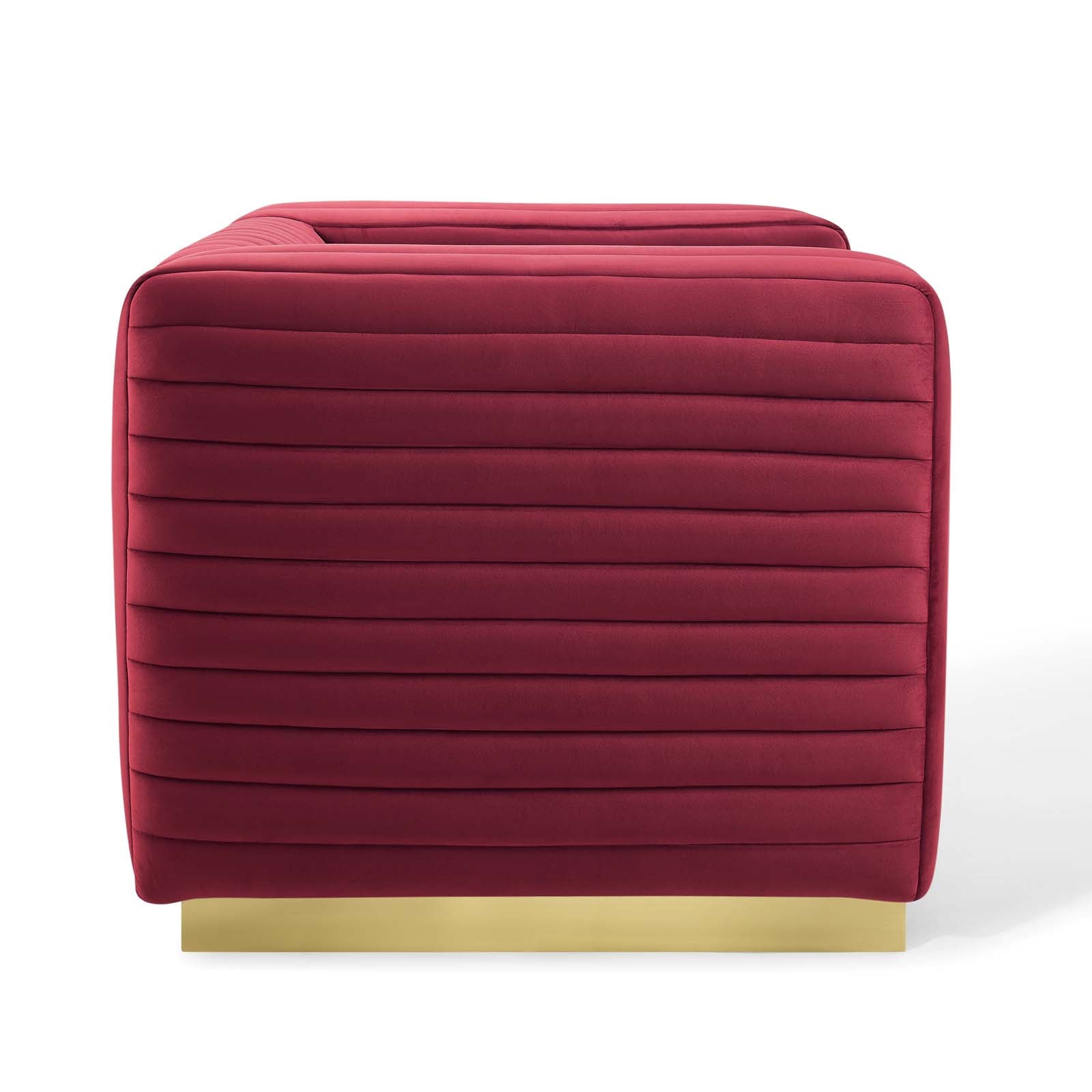 Maroon channel-tufted performance velvet accent armchair with horizontal channel stitching on the sides and slim gold legs.
