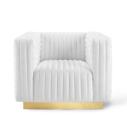 White velvet channel-tufted armchair with a gold platform base, modern lounge seating.