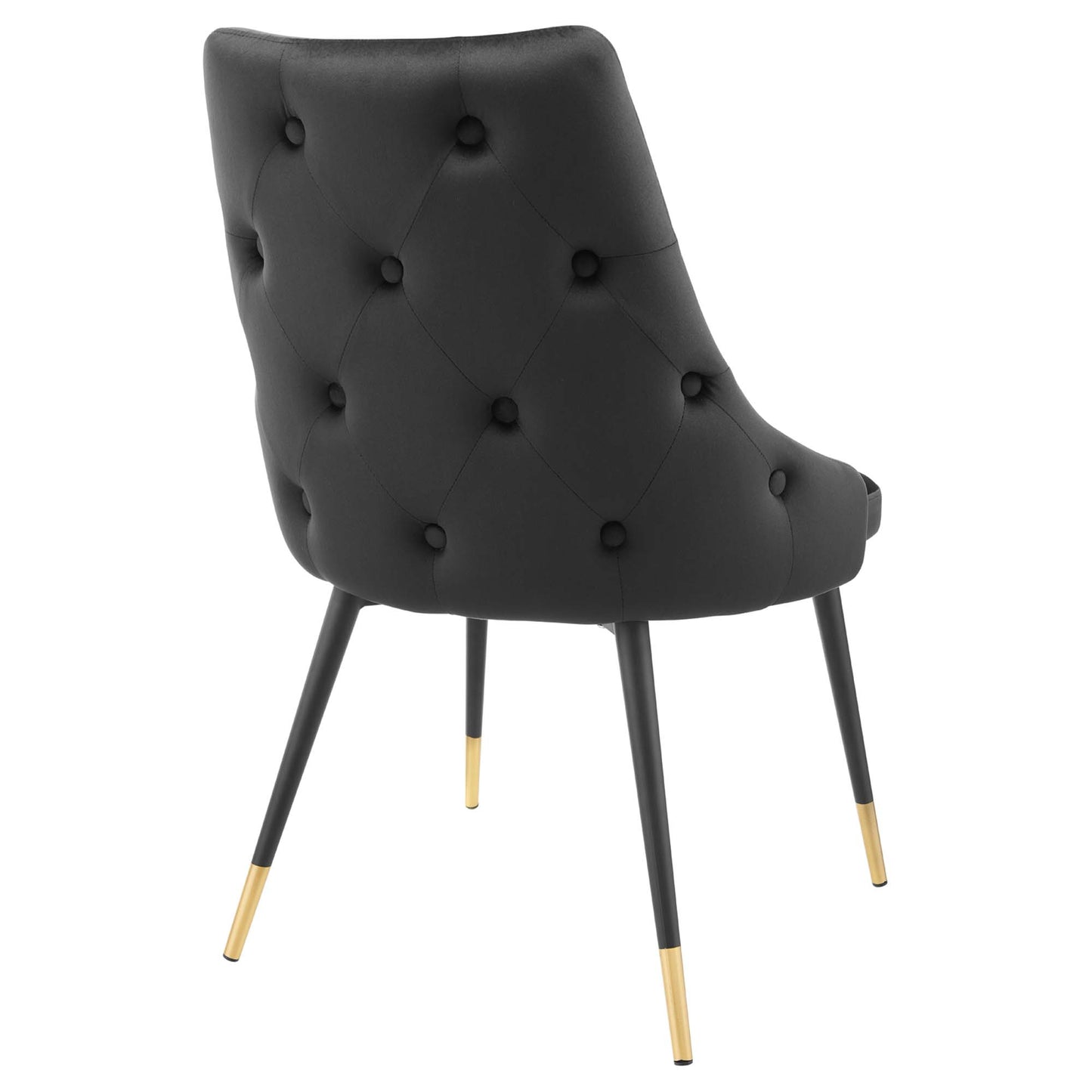 Black tufted performance velvet dining side chair with curved back and gold-tipped legs.
