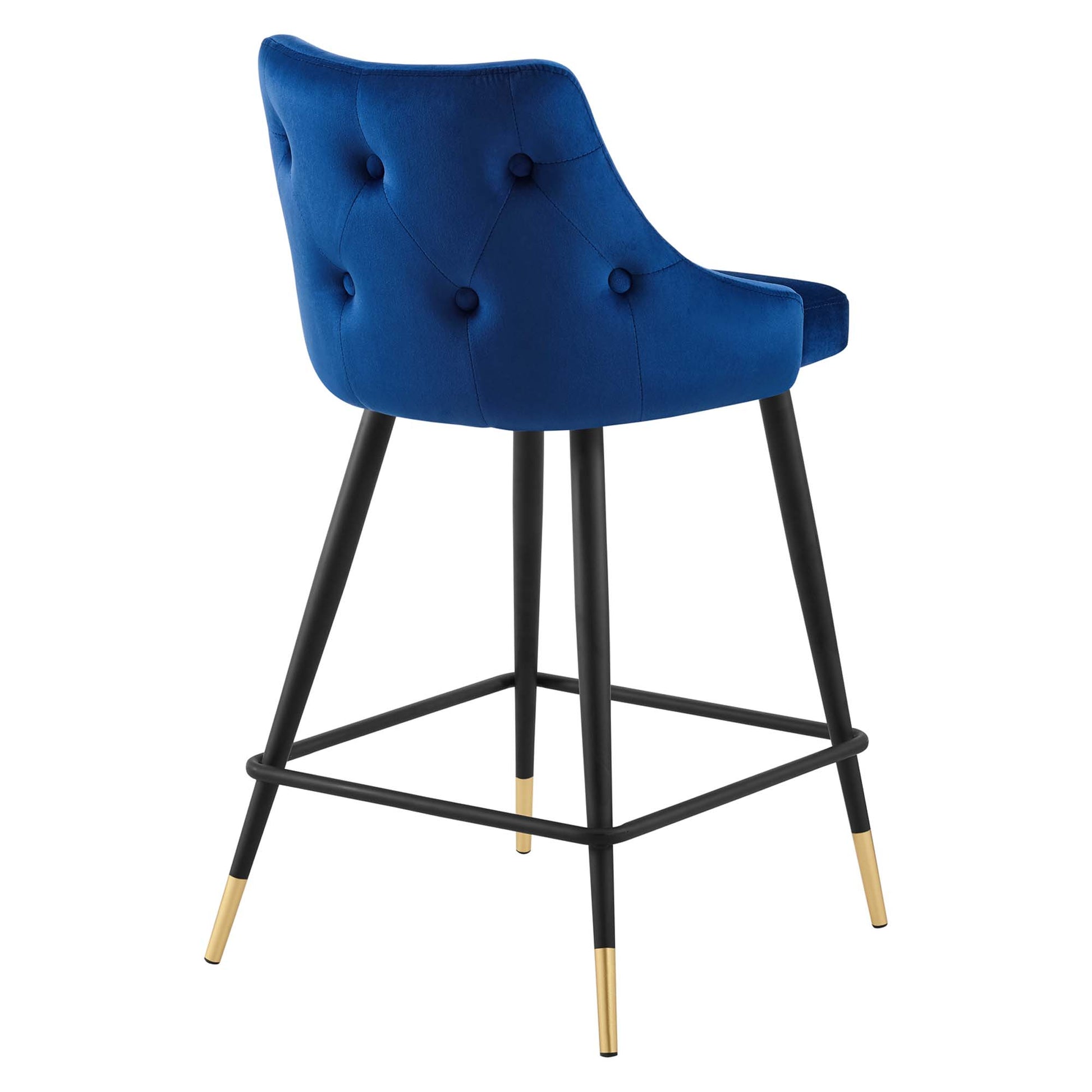 Navy velvet tufted-back counter stool with black metal legs, gold-tipped feet and footrest.