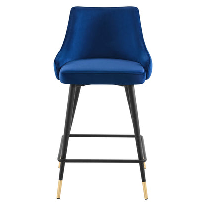Navy blue velvet counter stool with curved back, padded seat, black metal legs and gold-tipped feet.