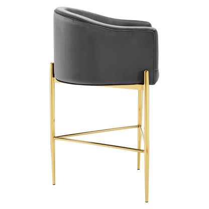 Charcoal curved-back upholstered bar stool with a gold metal frame and footrest.