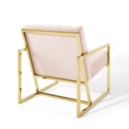 Gold-tone metal frame armchair with blush pink upholstery, geometric modern design.