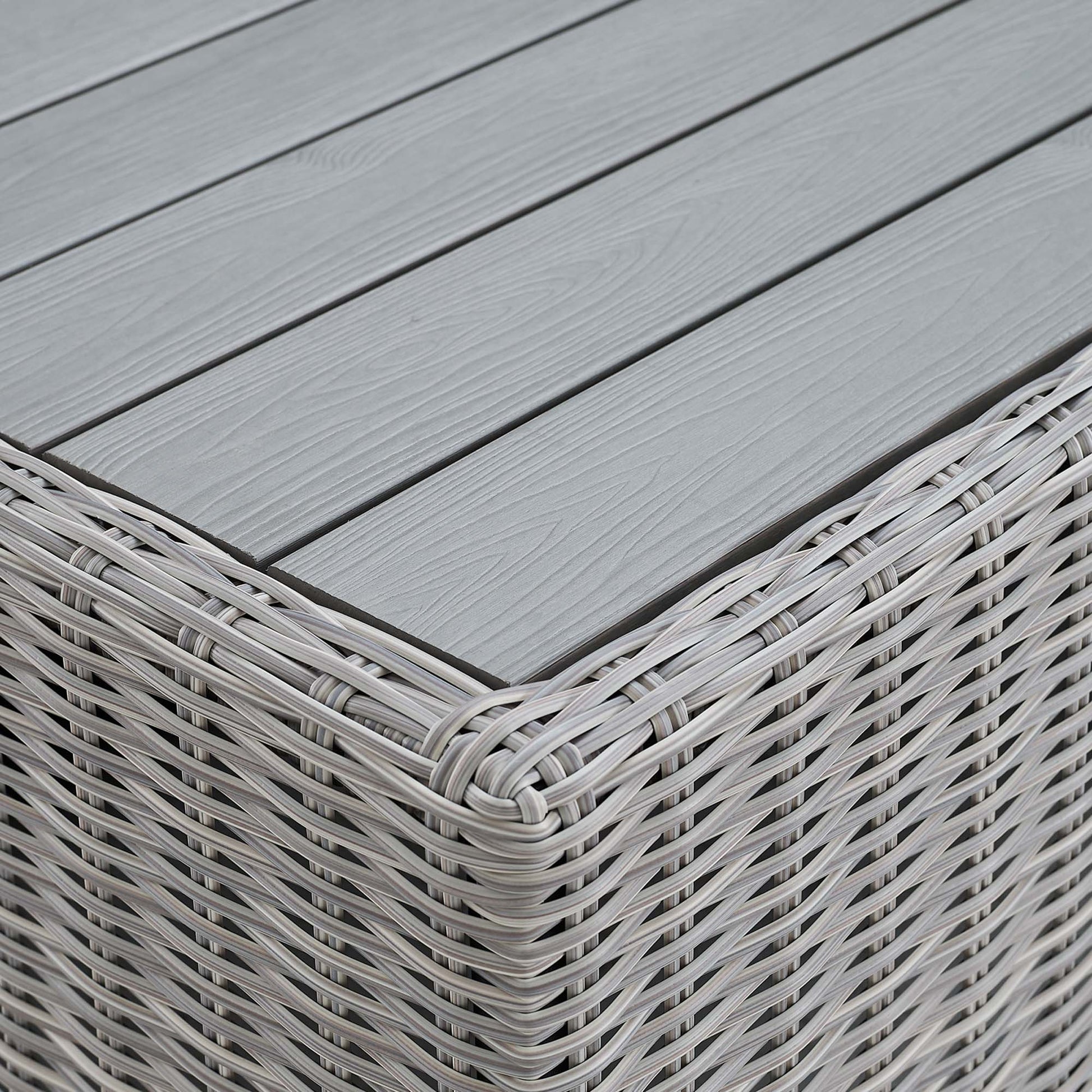 Light gray woven rattan coffee table with a slatted top.