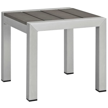 Three-piece white outdoor patio mesh furniture set with seating and a small table.