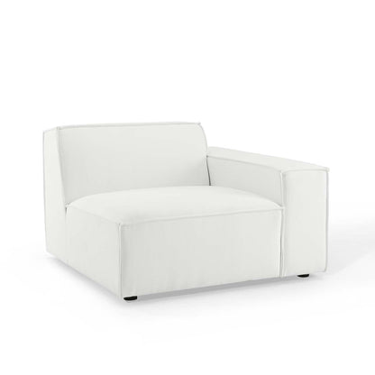 White leather-look two-piece sectional sofa with chunky cushions, square arms, and a contemporary low-profile silhouette.