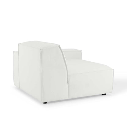 White fabric-upholstered modular two-piece sectional sofa with chunky square cushions and low black feet.