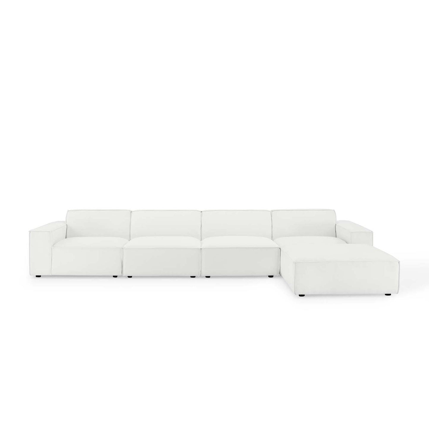White leather L-shaped sectional sofa with chaise for modern living room.
