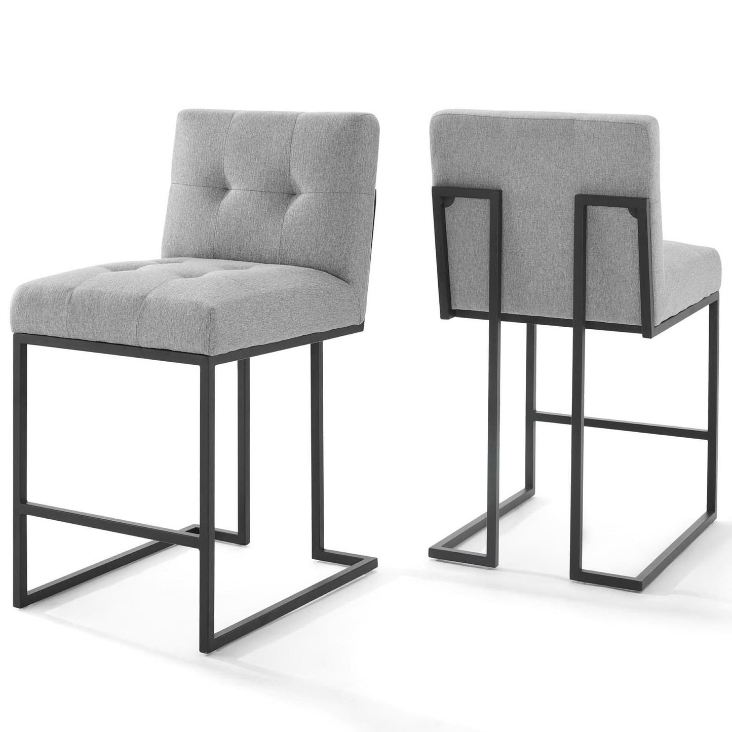 Pair of grey tufted upholstered fabric counter stools with black stainless steel frames.