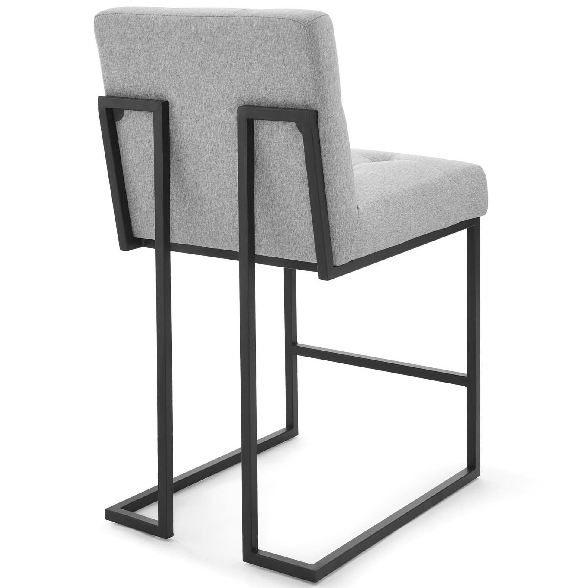 Grey upholstered counter stool with black metal cantilever frame and backrest.