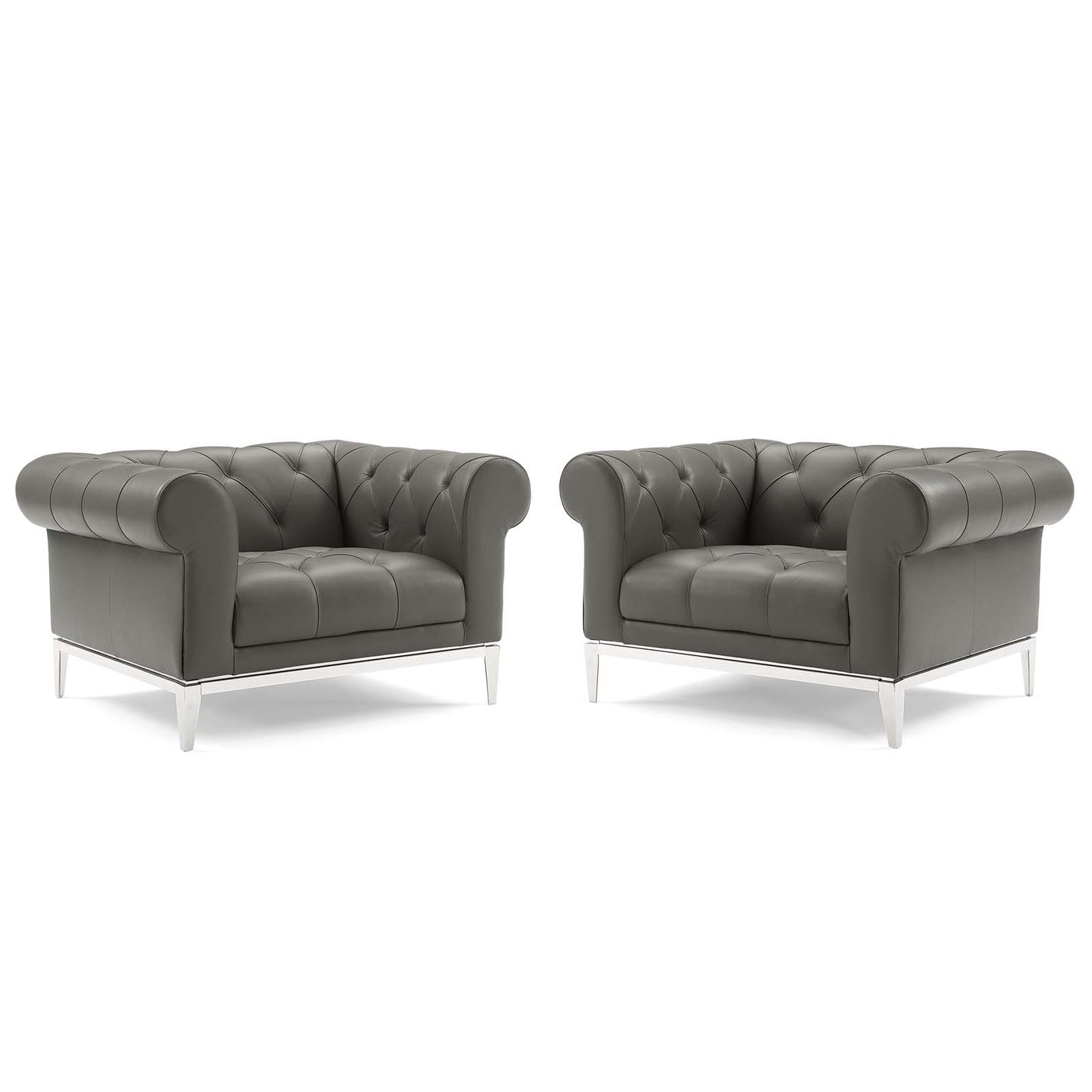 Pair of gray tufted leather armchairs with chrome metal legs, Chesterfield-style lounge seating.