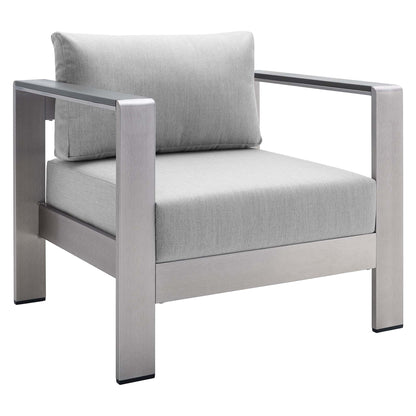 EEI-4225 silver-gray modern lounge chair with brushed metal frame and light gray cushions.