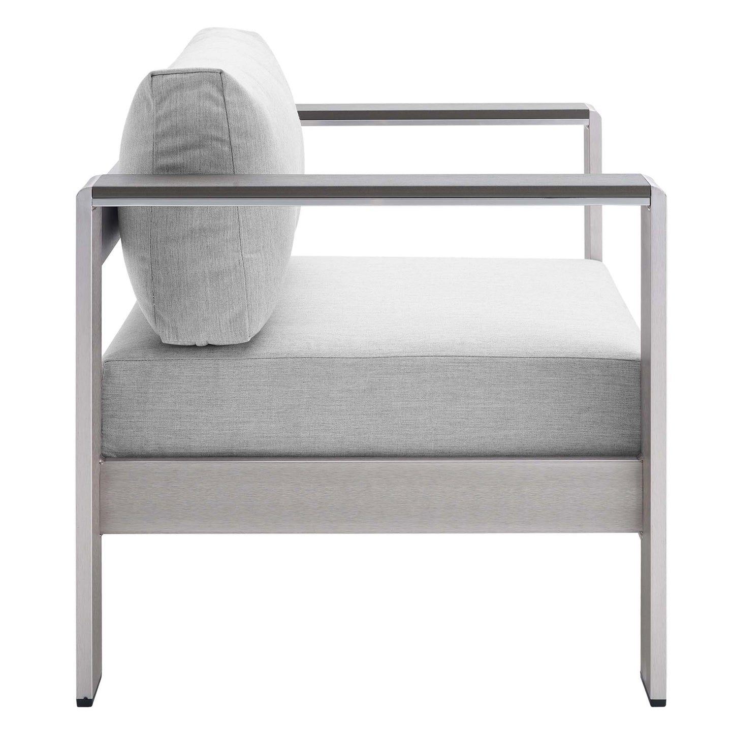 Modern silver aluminum outdoor patio armchair with light slate gray cushions and a matching back pillow.