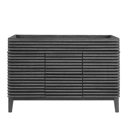 Charcoal gray bathroom vanity cabinet with slatted wood panels, tapered legs & two central doors.