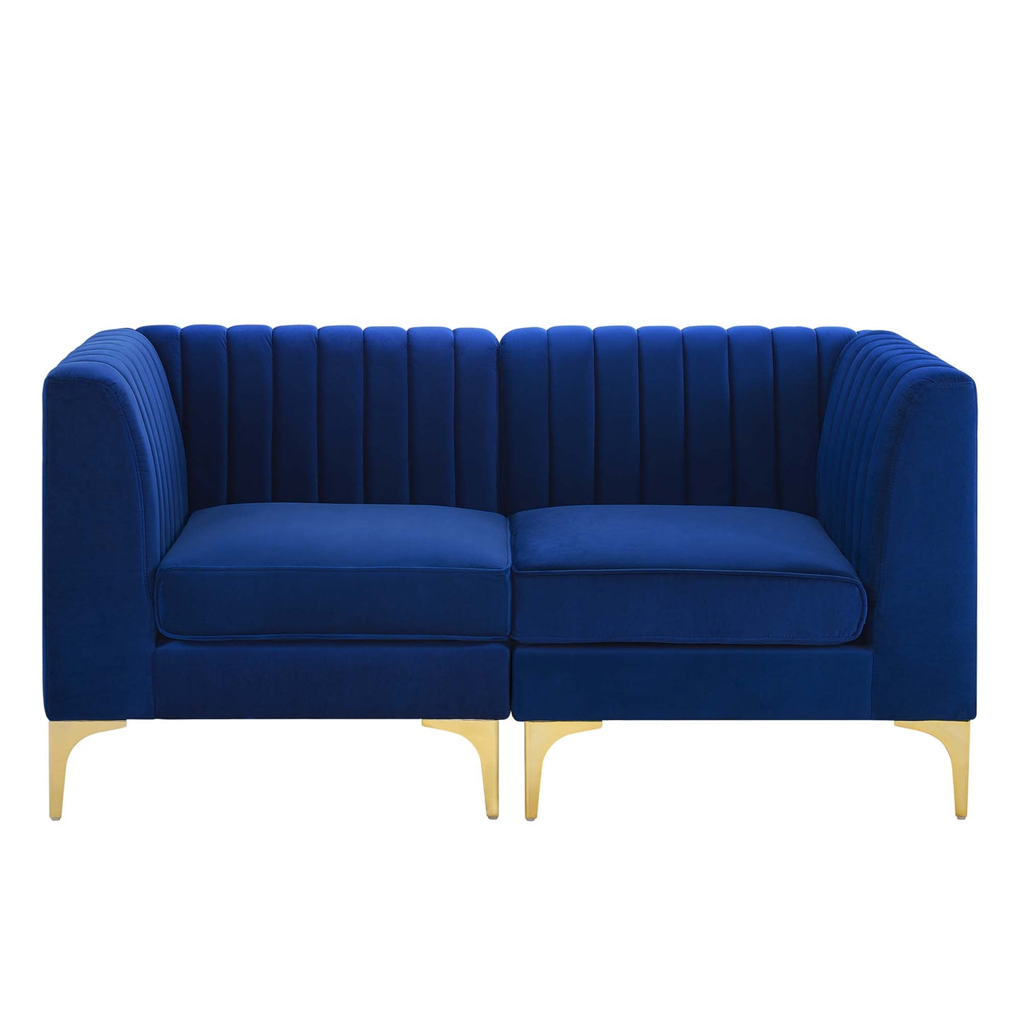 Navy blue velvet loveseat with vertical channel tufting, two cushions, rounded arms, and gold legs.