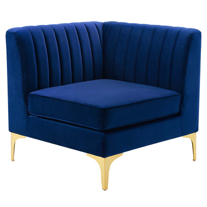 Navy blue velvet loveseat with curved back, vertical channel tufting, and gold metal legs.