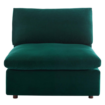Emerald green velvet armless accent chair with thick back and seat cushions, low profile, short wooden legs