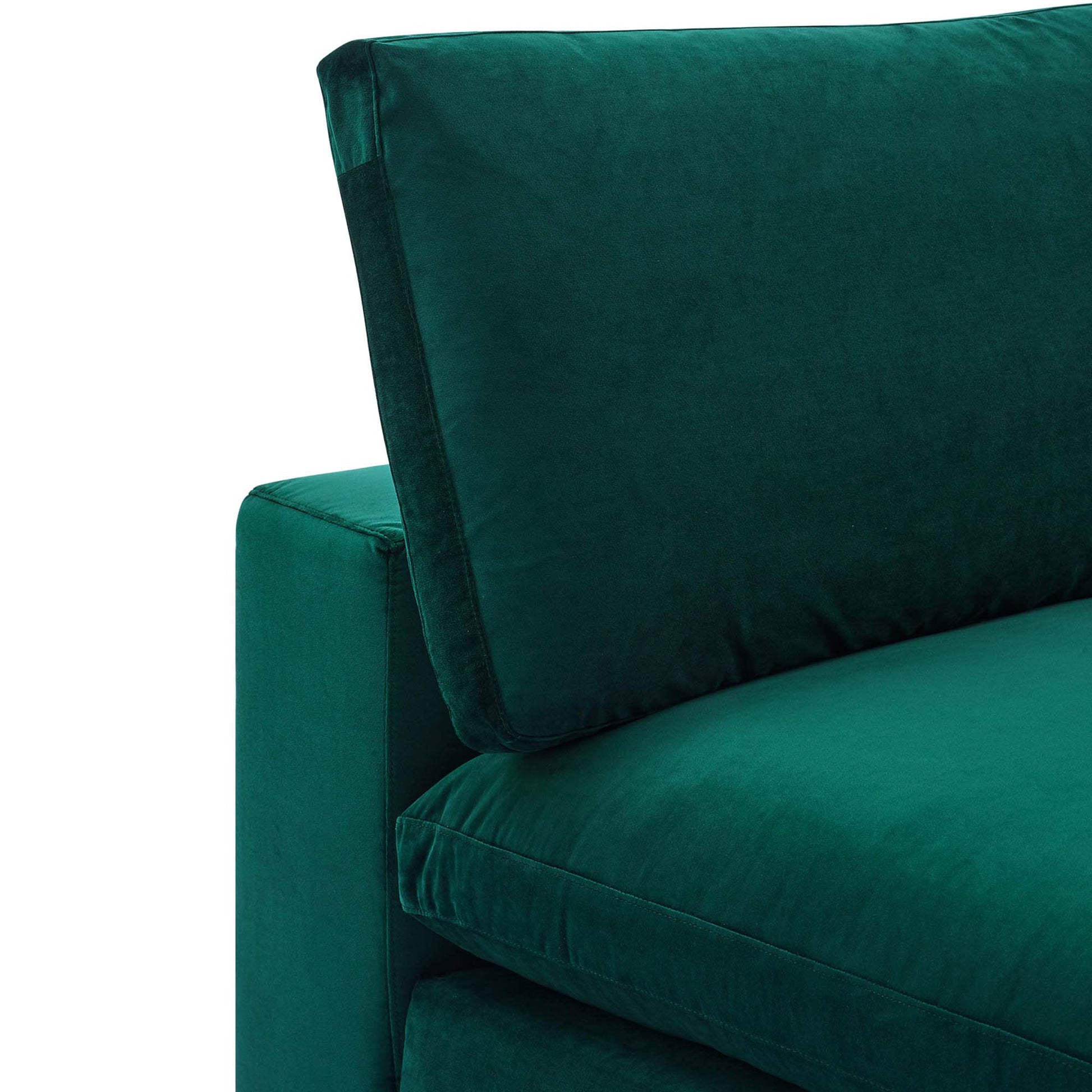 Teal green velvet armless chair close-up featuring a back cushion with piping, modern style.