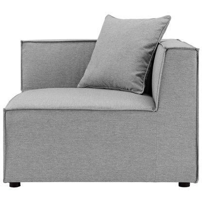 Grey textured fabric outdoor sectional sofa with square back cushions, low-profile arms and padded seats.