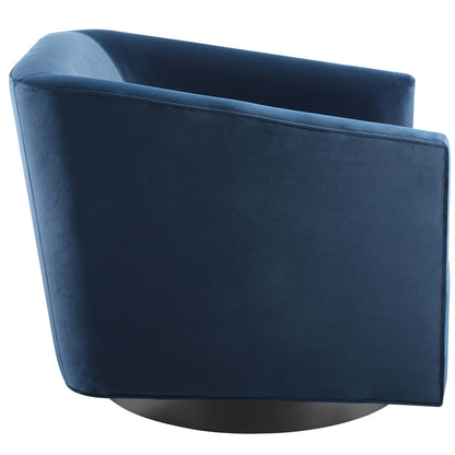 Blue velvet swivel barrel chair with rounded sides and black circular pedestal base.