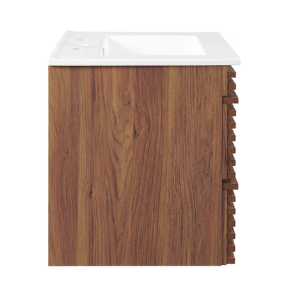 White 24" wide wall-mount bathroom vanity with a rectangular countertop sink.