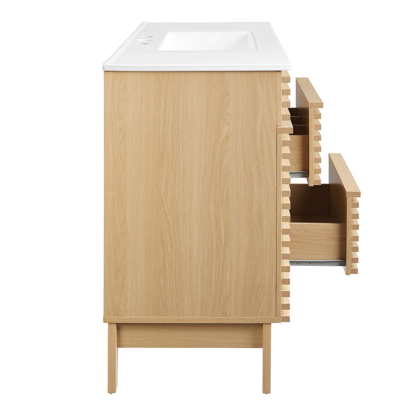 Natural oak bathroom vanity with white sink top and slatted pull-out drawers on the right.