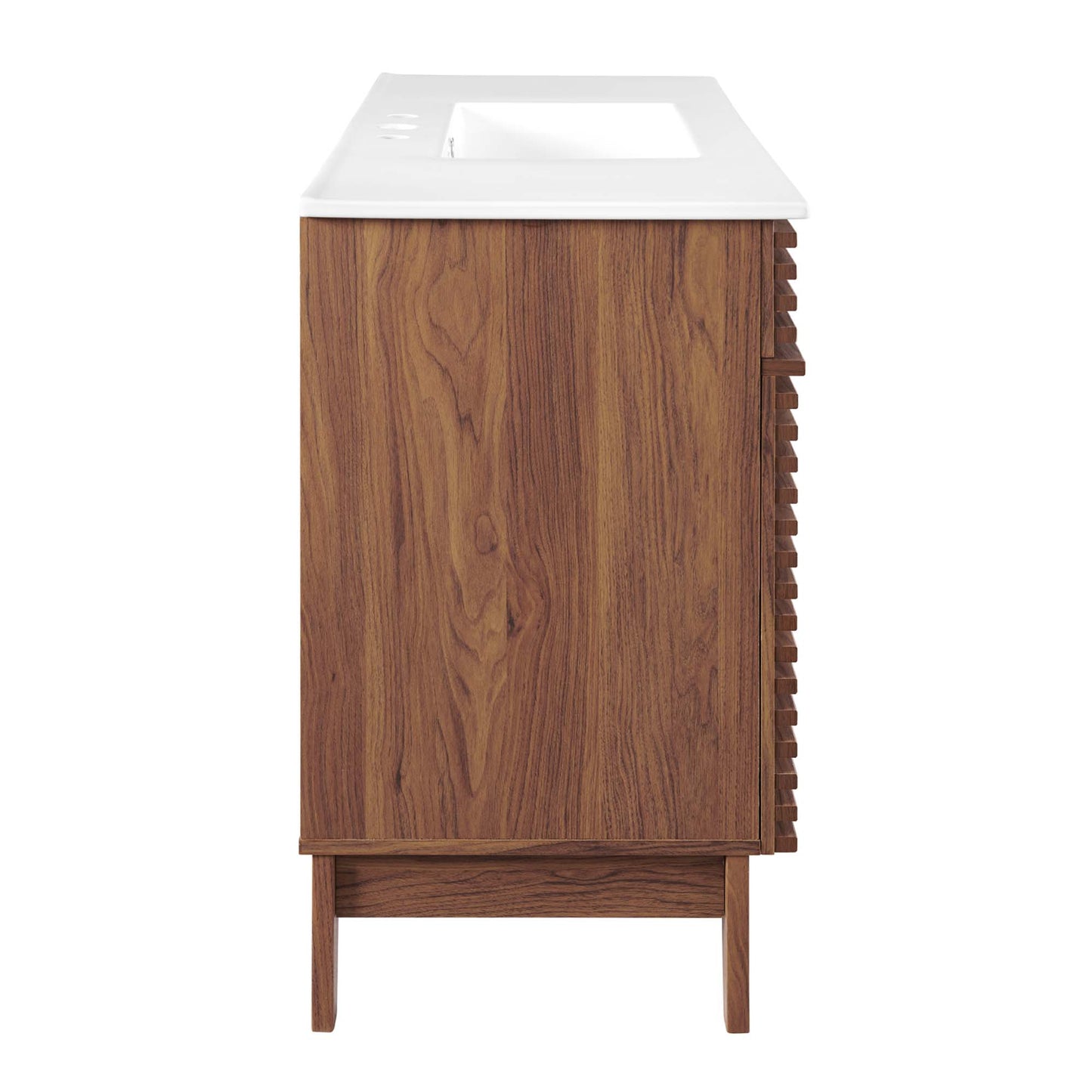 Walnut wood vanity with white top and recessed sink opening; slatted side panel and raised legs.