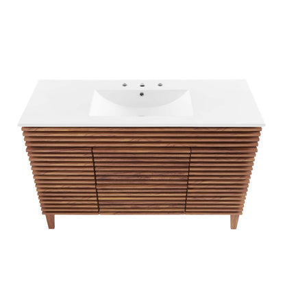 White rectangular bathroom vanity with integrated sink atop a walnut slatted cabinet and short legs.