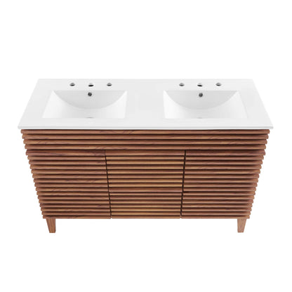 Double sink vanity with white countertop and two rectangular basins atop a walnut slatted cabinet on legs.