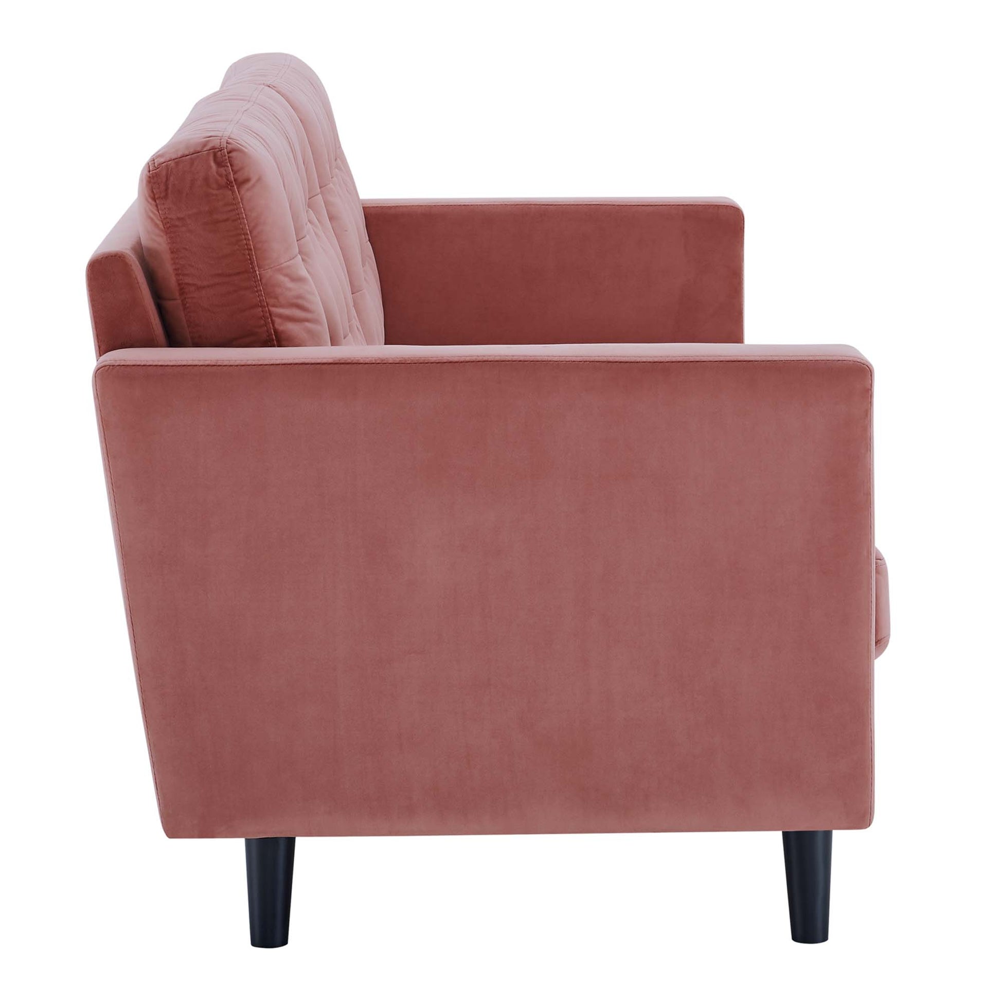 Dusty rose velvet sofa with square arms & cushioned back, all on black tapered legs.