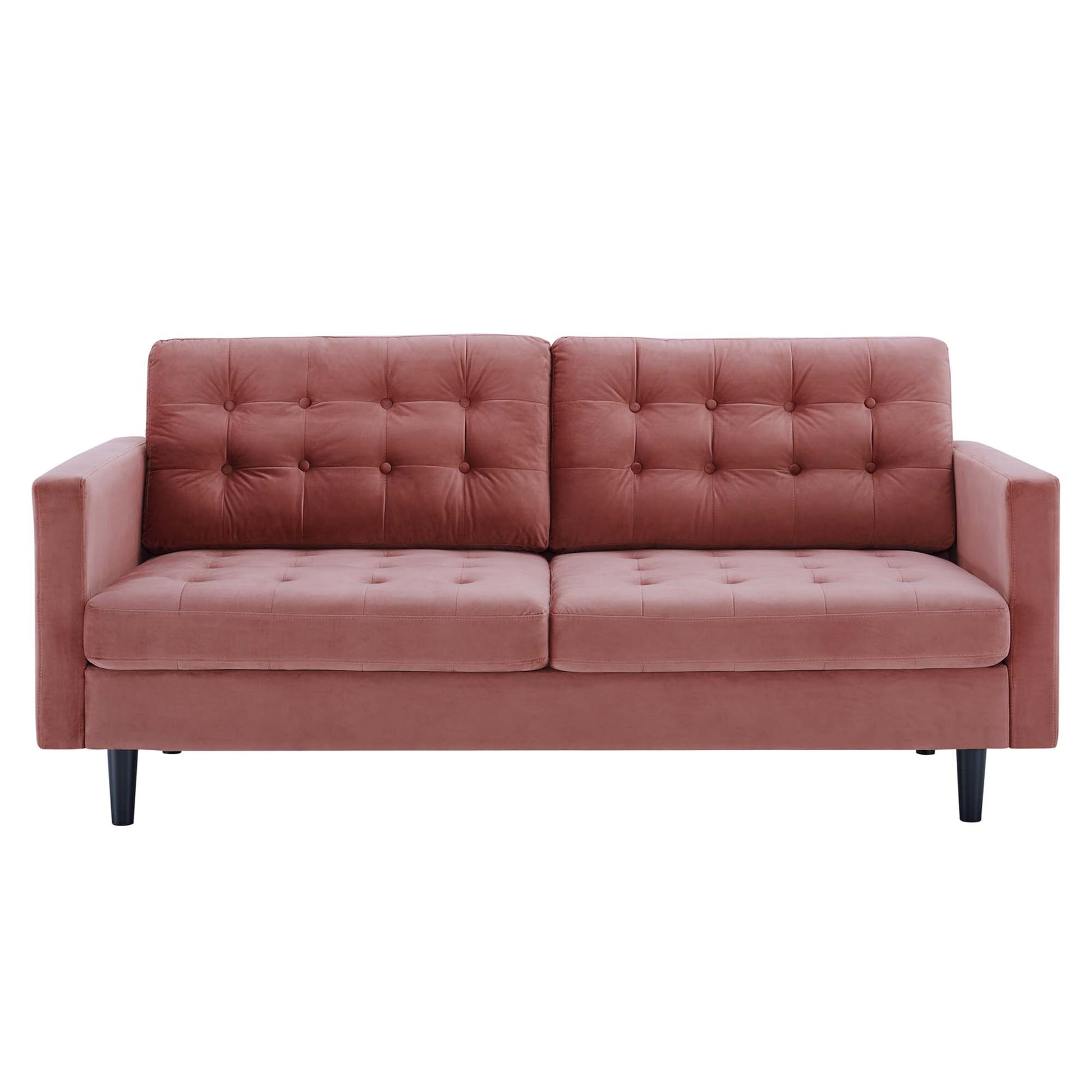Dusty rose velvet sofa with tufted back cushions, square arms, two-seat design, black tapered legs, mid-century style.