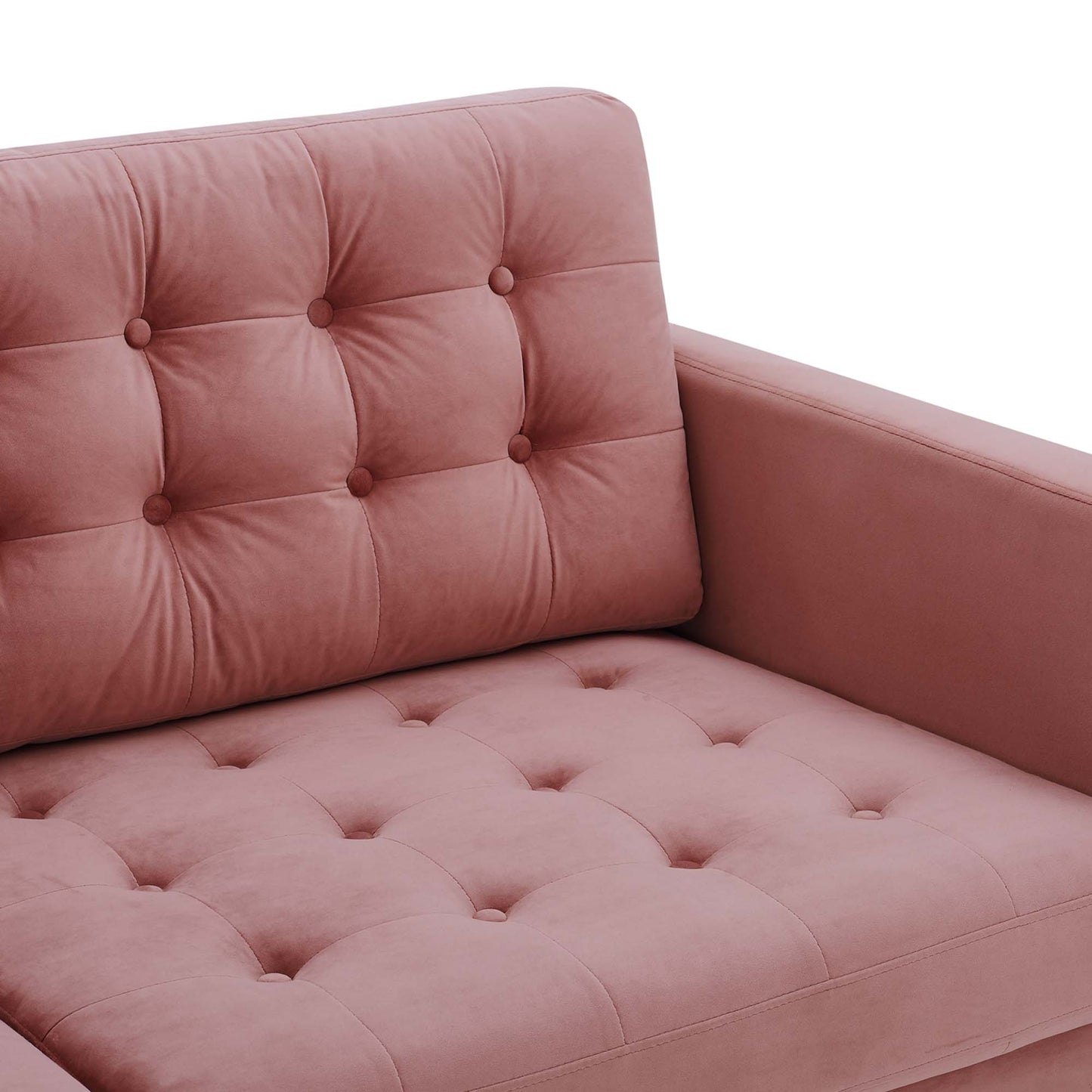 Dusty rose velvet tufted sofa with buttoned back and seat cushions, straight armrests.