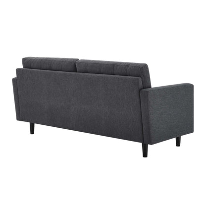 Charcoal gray tufted fabric sofa with square arms, two back cushions, and tapered black legs in a modern design.
