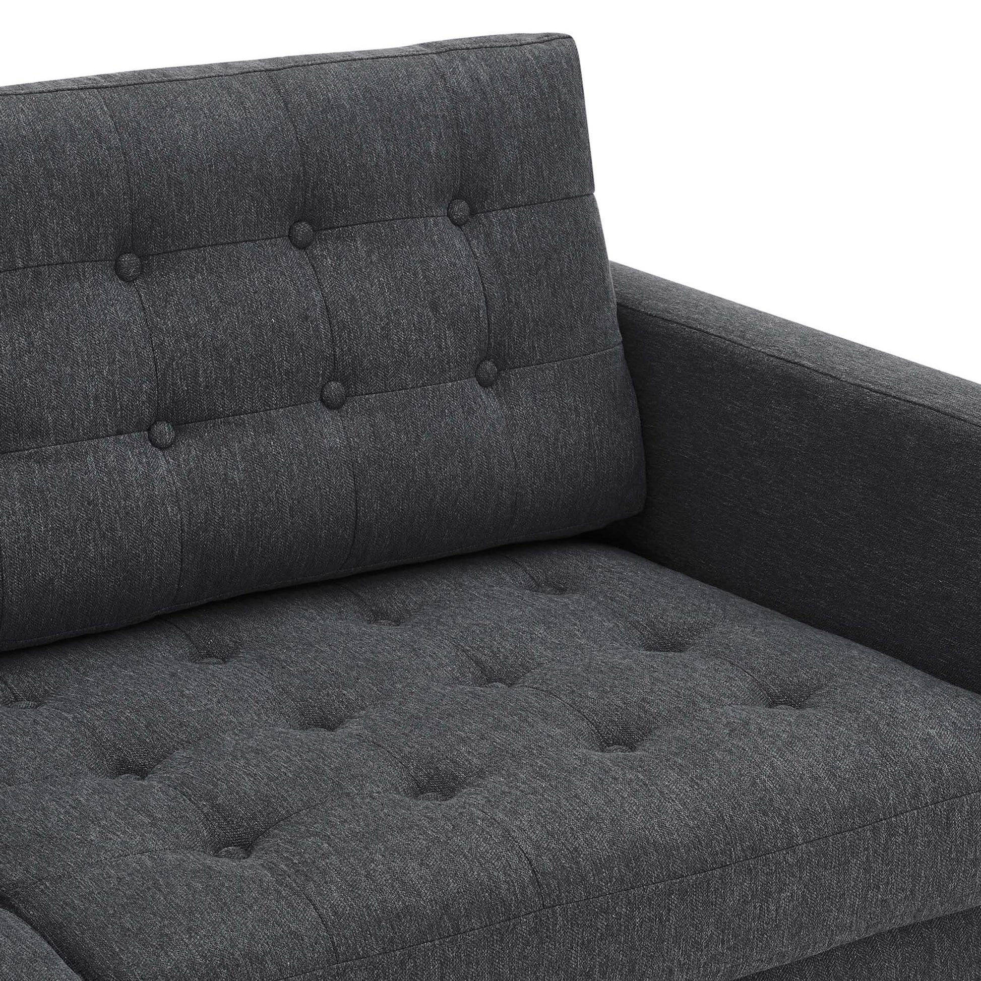 Charcoal gray fabric sofa with tufted seat and back cushions and square arms.