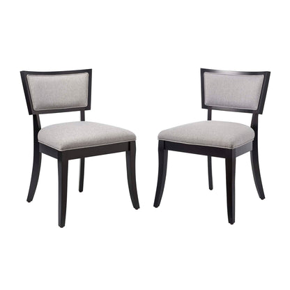 Pair of dark wood dining chairs with curved legs and light gray upholstered seats and backrests.